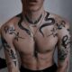 Modne tatuaże męskie na 2024! 120 popularnych wzorów